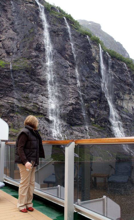 Traveling past the Seven Sisters waterfalls on the way out of Geirangerfjord.