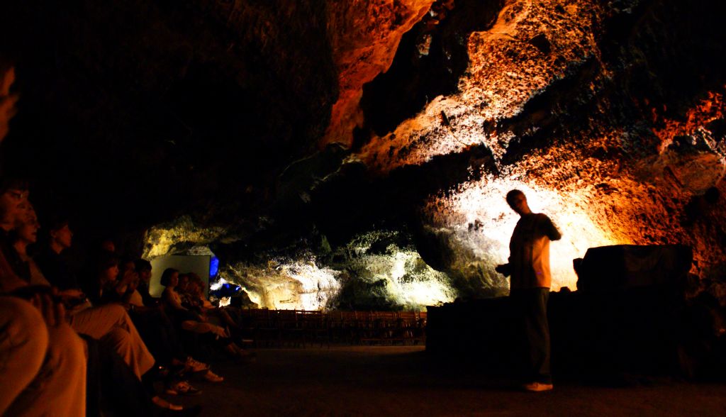 They had created a concert hall with seating for several hundred people in part of the cave.