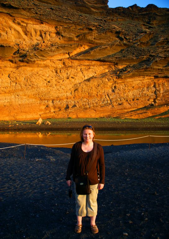 Because the El Golfo volcano is right on the coast, the sea has eroded half of the caldera away. The inner side of the other half can be seen behind Judith.