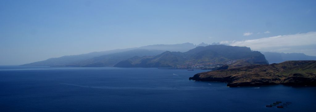 Looking back along the peninsula, I could see the whole of Madeira (although there was a bit missing from the photo on the right as my wide-angle lens was not quite wide enough to get the whole thing in in one go).I could just about make out Pico do Arieiro, where we were a few hours ago, just right of centre, where the line of the mountains starts to go rather wiggly (in a big “W”).
