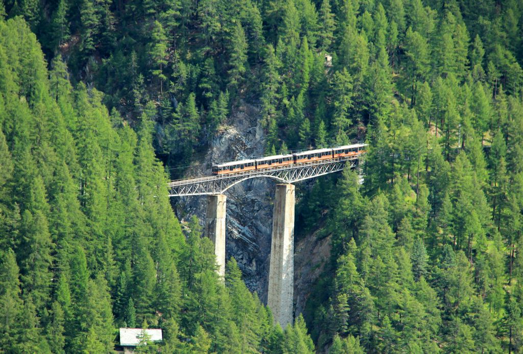 In the distance the train from Gornergrat passed over a bridge.