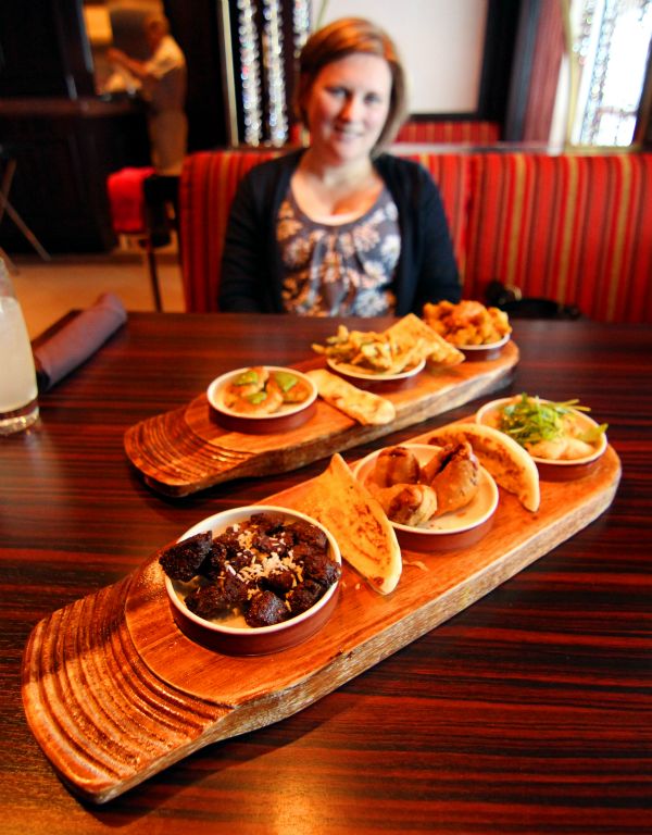 As we had such a fabulous dinner in Sindhu last night, we decided to go back for lunch. You chose three dishes, which were served on one of these wooden platters. Mmmm, curry yummy.