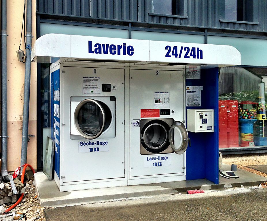 Tuesday - Nothing particularly unusual about a launderette, except that this one is outdoors, in the car park of the local supermarket. Presumably in the French countryside there is a steady demand for being able to wash and dry your laundry at any time of the day or night?