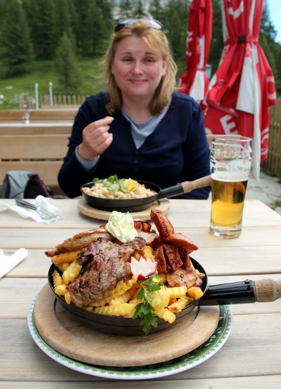 While I was tempted to keep lunch light and just order a bowl of soup, I was intrigued by the “Turlwandhutte Special”, which turned out to be a massive pan of chips topped off with sausage, beef and pork steak. Judith’s pasta dish wasn’t appreciably more modest in its aspirations.
