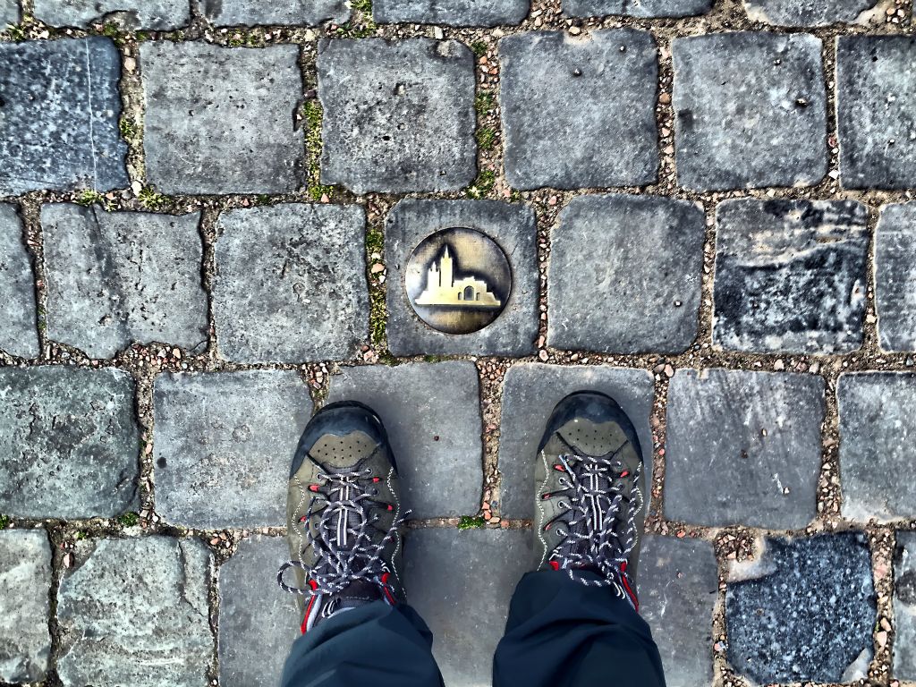 After what turned out to be a late-and-not-so-light-lunch we thought the best way to see town might be to follow their challengingly signposted Heritage Walking Route. It's a three-and-a-bit mile route around Ieper, marked by these studs in the pavement. Cunningly they generally only put the studs in places where you need to make a turn, so you end up spending most of your time studying the ground intently for the next set of studs rather than looking at the lovely buildings.