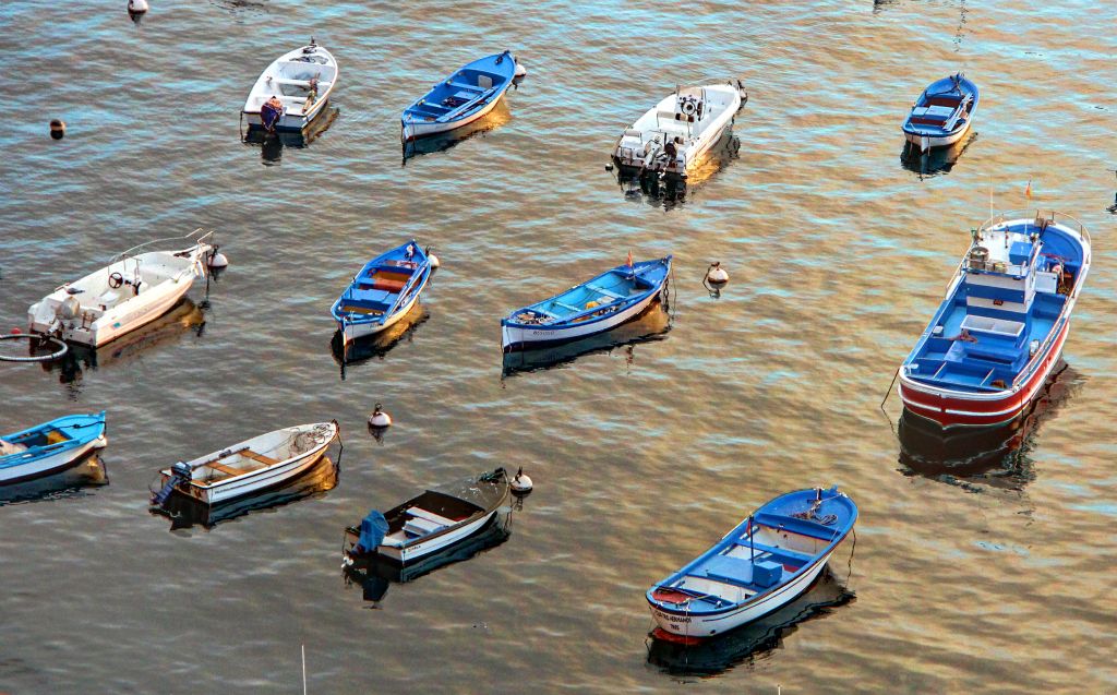 Boats in the habour at Playa Santiago at sunrise.