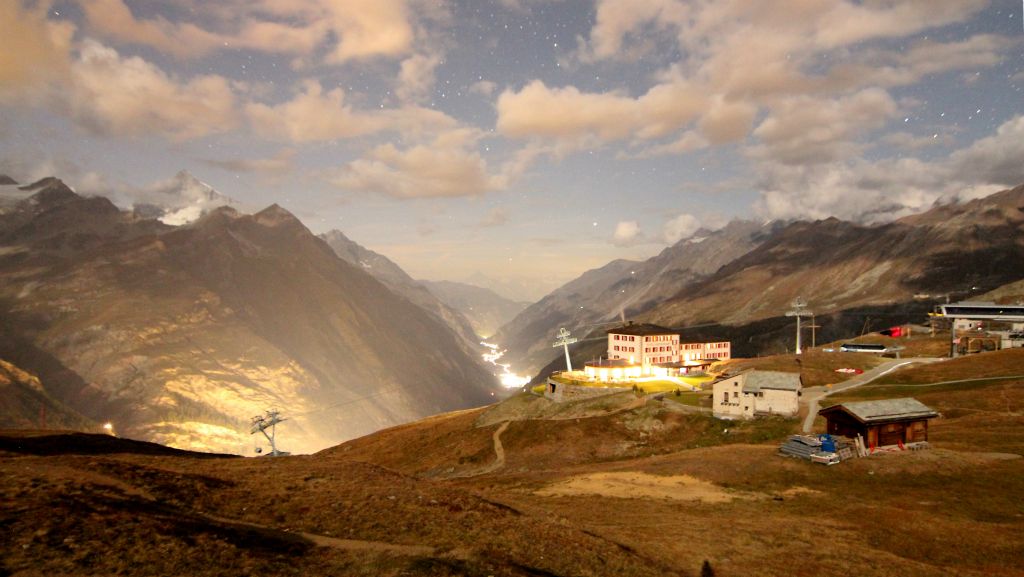 Our hotel (the Riffelhaus), with the glow from Zermatt down in the valley visible on the left of the photo.