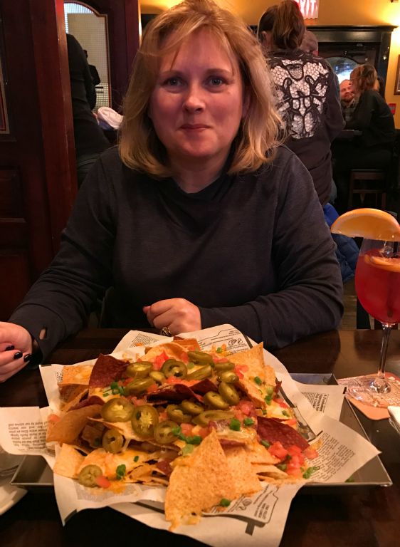 We thought we'd have something light so we just ordered a plate of nachos to share. Here's Judith with that the menu calls "a foot of nachos". This is the smallest portion of nachos they had. It is apparently possible to order "five feet of nachos". I would have quite liked to see that.Time for bed.Lovely beers consumed today - just a Wild Rose Red Wheat Ale.