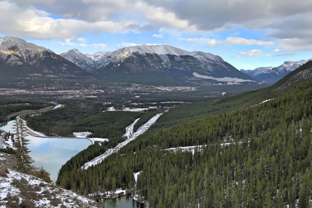 After lunch we continued south to Canmore. This was the view of Canmore from the dam high above the town. Barely a hint of snow here.