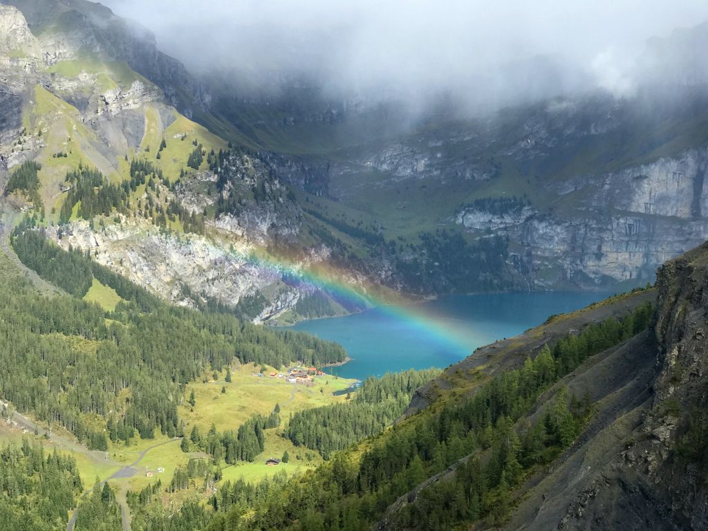 Off to my right a lovely view of Oeschinensee was appearing through the dispersing clouds. And with a rainbow.