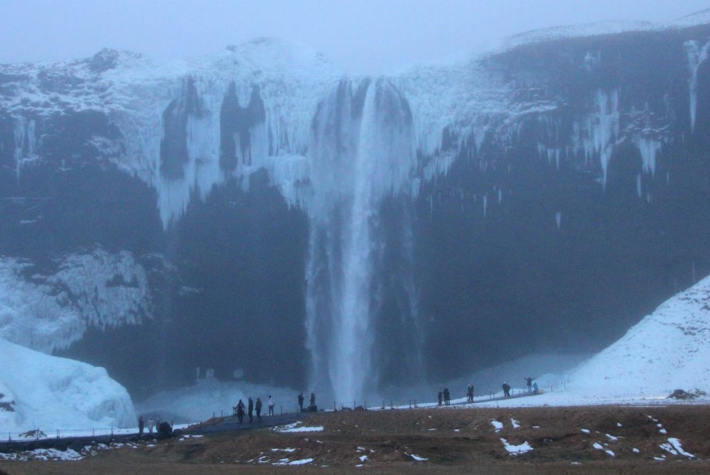 It was 4pm and getting pretty dark by the time we made it to Seljalandsfoss. Given the time and the rapidly fading light, there weren't too many people still around, as you can see from the photo. It still cost £4 to park though.