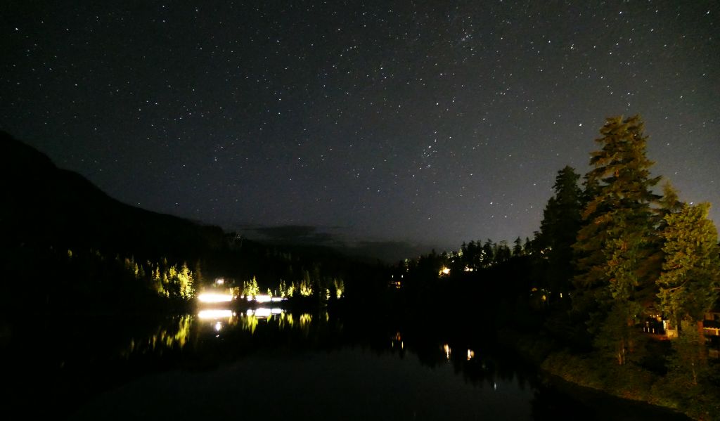 I woke up at about 2am and went out on to the balcony to look at the stars. I could hear a train coming so I went and got my camera (as you can hear the trains from miles away so there's plenty of time to prepare for their arrival). The bright lights in the bottom left are the train passing Nita Lake.