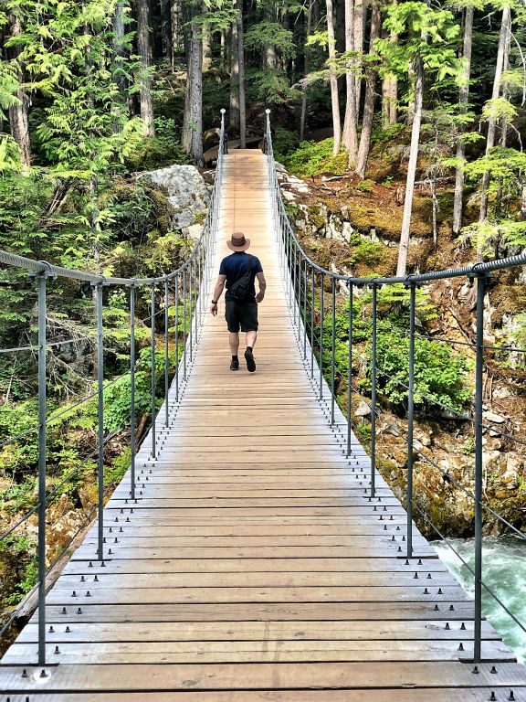 There's a very sturdy and impressive suspension bridge on the trail. That's me crossing, as taken by Judith.