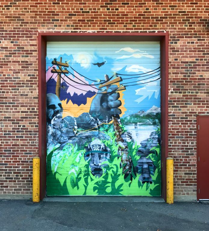 This mural was painted on a garage door.