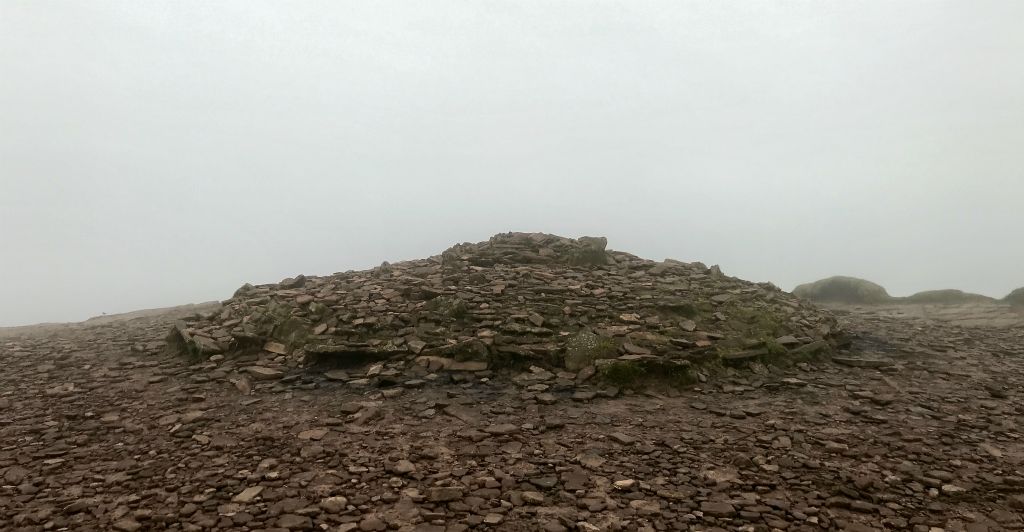 This is the pile of rocks on the top of Corn Du, which presumably signifies the top.