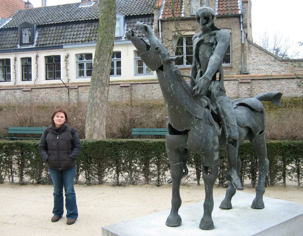 Judith standing near one of the Four Apocalyptic Knights in Arents Courtyard. Perspective is making the Knight look much bigger than it actually is.