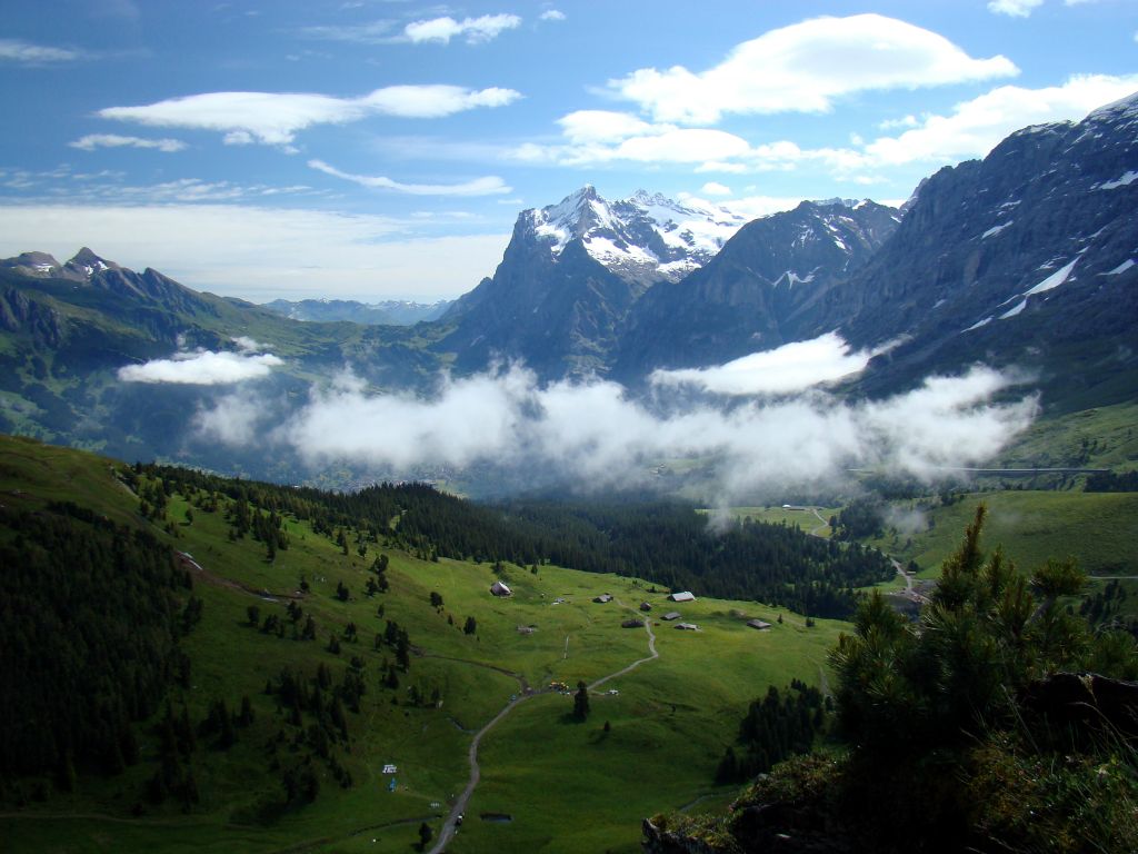 Looking down to Grindelwald from the path to Mannlichen. Grindelwald is largely obscured by cloud.