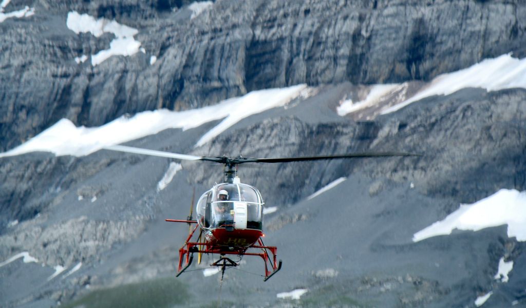 This helicopter was being used to ferry building materials up the mountainside. I didn't manage to quite get it in the middle of the picture because it was moving so quickly. Eiger in the background.