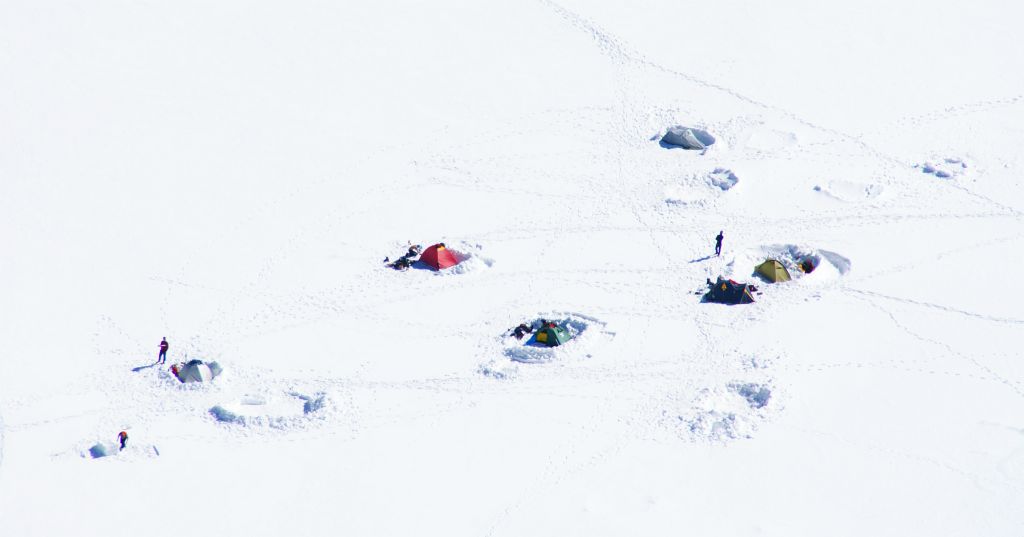 These camping enthusiasts had put their tents up out on the snow.