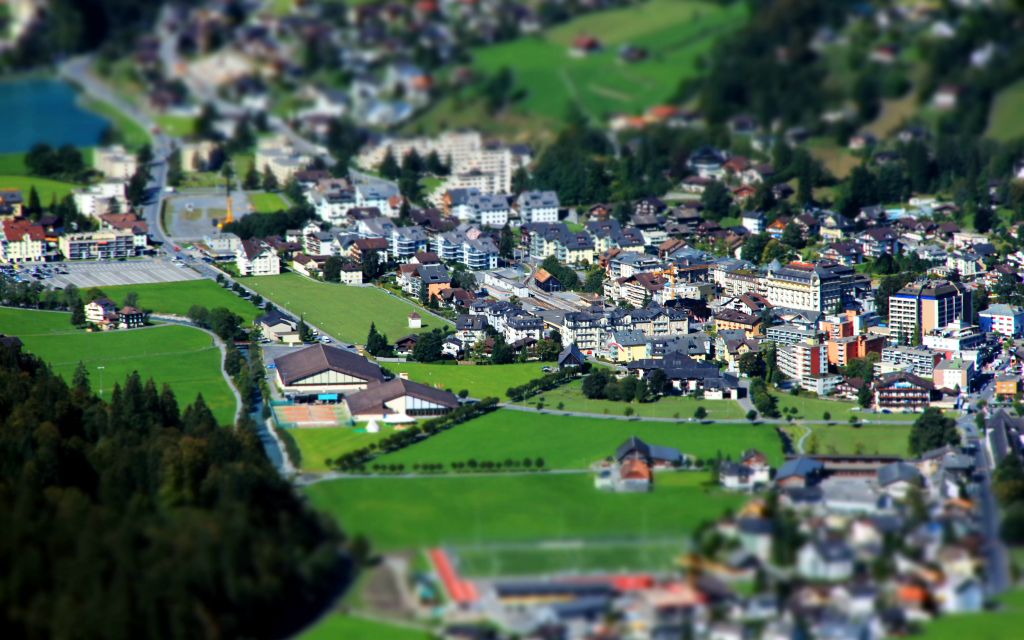 Is it just me, or is this really weird? Applying a "miniaturisation" effect to a photo of Engelberg has made the town look like a model village. Spooky.