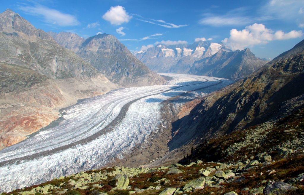 After about an hour of steady climbing, I make it up to the ridge and get my first view of the stunning Aletsch glacier. I’ve taken photos of it because, well, you have to. But they just don’t do it justice because the scale of the thing is so mind-bending. The ice is about three quarters of a mile wide and the mountains that you can see in the distance are six or seven miles away.This is definitely one of the most amazing sights I have ever had the pleasure to experience in my entire life. If you ever find yourself in the region of Bettmeralp, I very strongly urge you to take a couple of hours out of your day to get the cablecar up to the Bettmeralp Bergstation and see this. You won’t regret it. Unless the weather is rubbish, but that’ll be obvious from the bottom anyway.I slowly make my way along the ridge towards the Bettmeralp Bergstation, stopping frequently to look at the view and take photos that completely fail to capture the magnificence of the glacier.