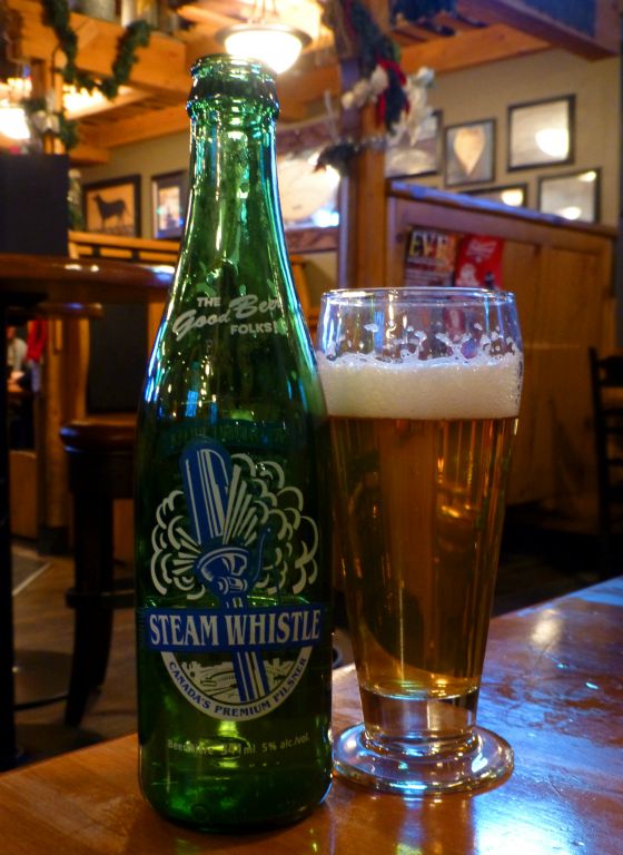 Having settled into the hotel (i.e. dumped our bags and locked anything valuable in the safe), we walked into town for a beer and some dinner.We had a few nice beers in the bar of Banff Avenue Brewing before heading across the road to the Elk and Oarsman, where I had this nice bottle of beer/lager from the Steam Whistle brewery in Toronto, which we also happen to have visited. It’s based in the old railway sheds right next to the CN Tower and they used to give out free beer in the “factory shop” to anyone that wandered in. Maybe they still do.