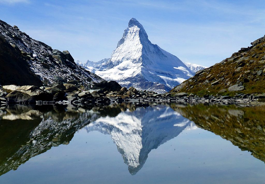 Pretty much at the point where the mountain meets the moraine, there's a small, natural bowl with a little lake/pond in it. Being quite sheltered from the breeze, the water was glass smooth, creating this beautiful reflection of the Matterhorn. It was well worth the four hours or so had taken me to hike up here.I think this is my favourite photo of the week.