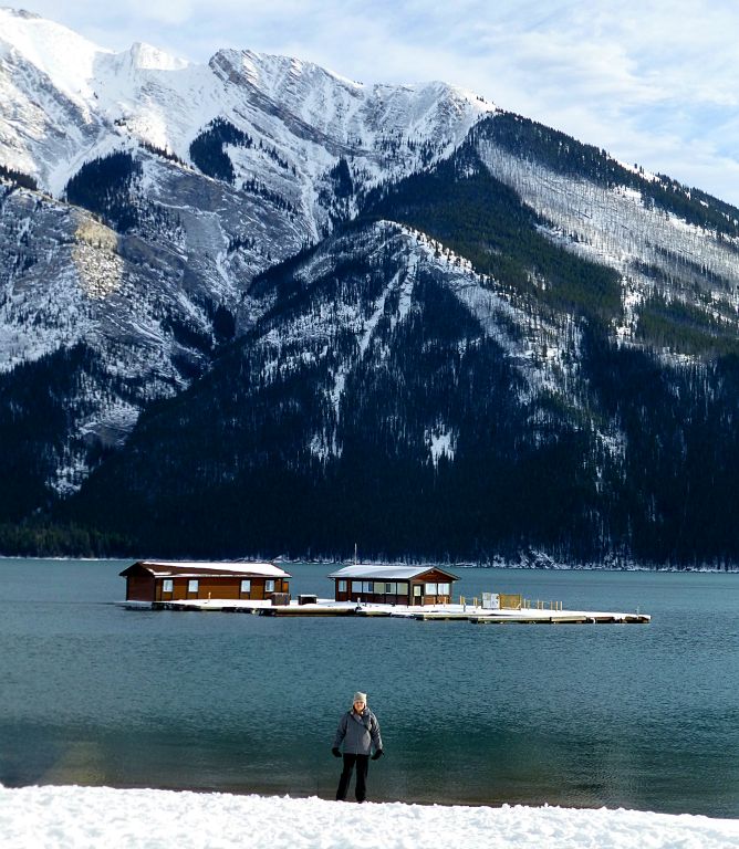 A couple of miles later and we're at Lake Minnewanka. Here's Judith on the boat ramp, with Mount Inglismaldie in the background.