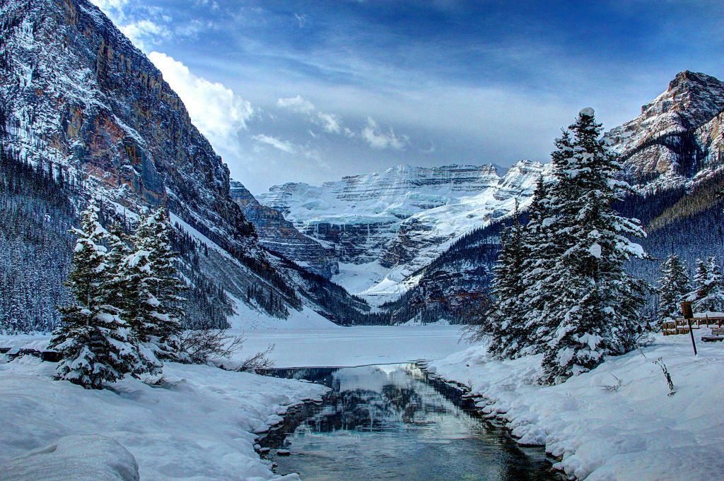 Back in the car, we drove the few miles from the ski resort to Lake Louise itself. Here's the view from the little stream that flows from the eatern end of Lake Louise. As you can see most of the lake was frozen over and covered with snow.