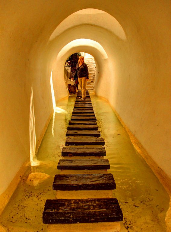 A water-filled tunnel with stepping stones in Lag Omar. Just what everyone should have in their house. Brilliant.