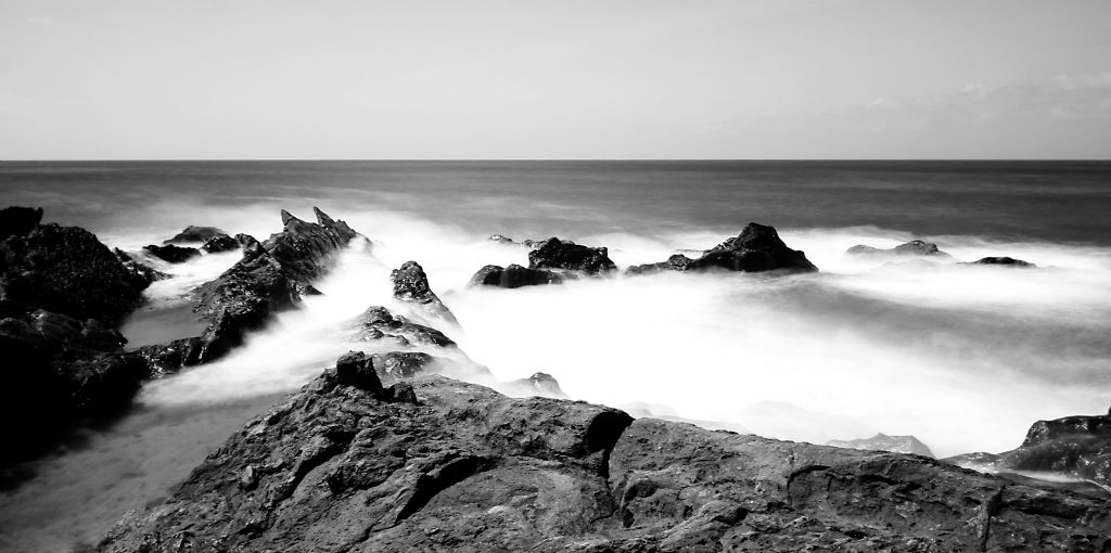 This is something like a six second exposure of the waves crashing over the rocks.