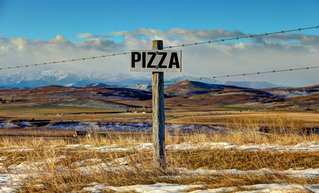 I have no idea why someone would attach a sign saying “PIZZA” to a post out here. It’s not like there was any additional information attached to the adjacent posts identifying the potential location of the pizza. I thought it made a nice photo though.