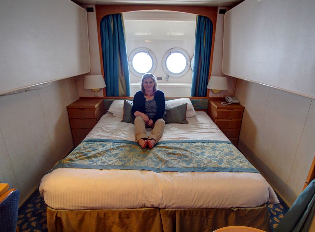 Judith in our cabin. On the plus side, we had a porthole each to peer out of. And we were very close to the water, right at the front of the ship on the lowest passenger deck.It would have been interesting to have been in this sort of location when we sailed through that insane storm on the Atlantic on the way back from Icelend.