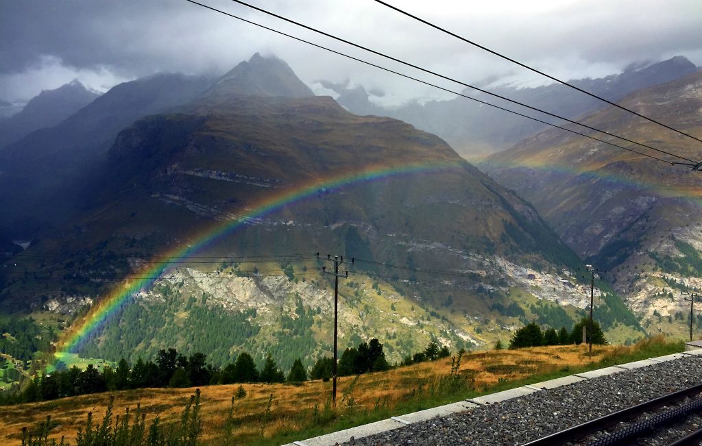The rainbow was visible from the train most of the way down into Zermatt.