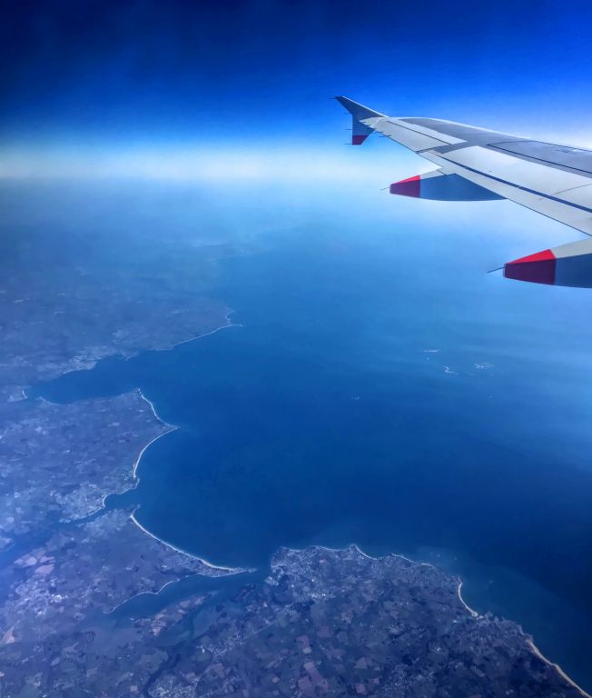At least the plane got away more or less on time. Here we are flying over the coast of France and out into the Bay of Biscay.