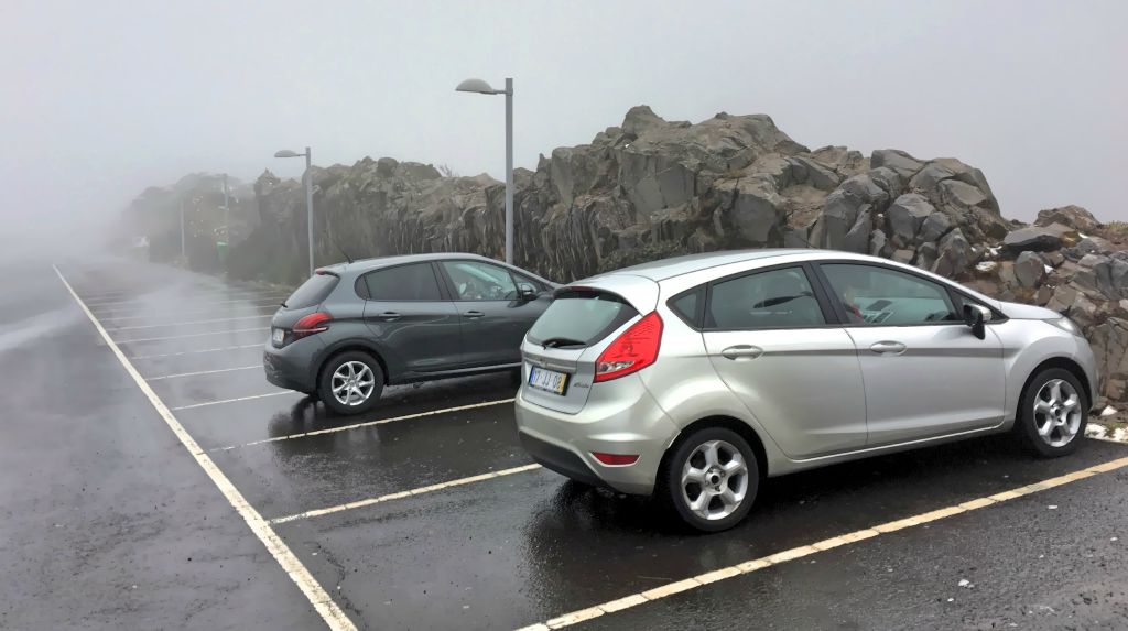Terrible plan as it turned out. It was 2C and blowing a freezing gale up there. As you can see from the photo, there was only one other car apart from ours in the car park (the dark grey one was ours).