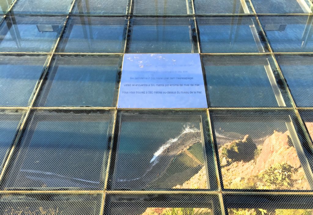 Awesome view through the glass floor 580m (1,900 feet) down to the shore.