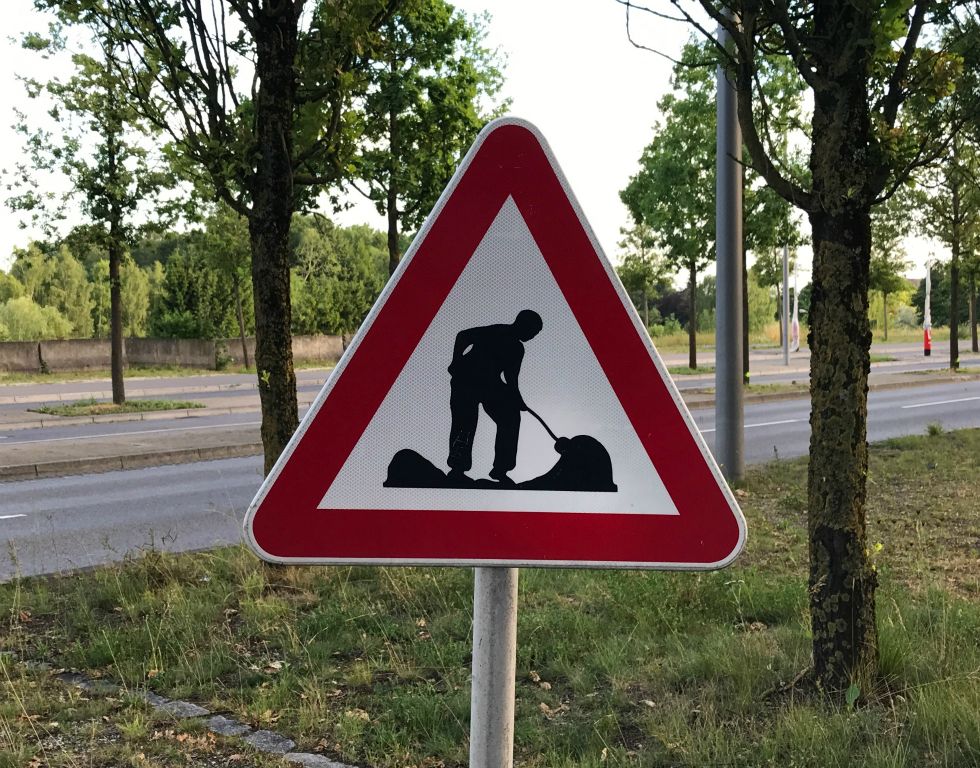 The Luxembourg sign for roadworks is rubbish compared to our man-with-umbrella.