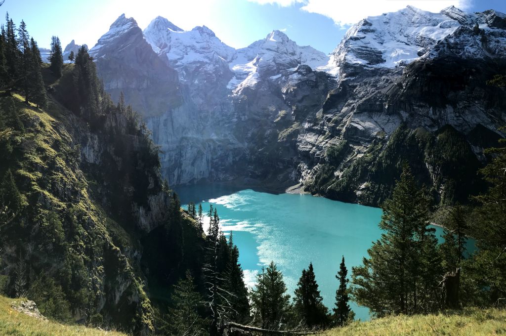 My first view of Oeschinensee. Unfortunately at this time of the day the sun was low over the mountains on the other side of the lake, which made it challenging to get a good photo.