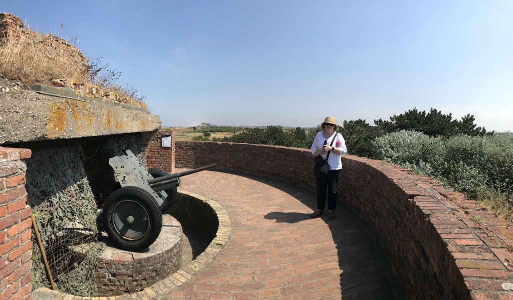 This gun emplacement is particularly interesting as it was hurriedly built a few weeks after D-Day, so it's a) made of bricks rather than reinforced concrete, and b) facing inland. Everything else here faces the sea.[This was taken with the Panorama setting of my phone's default Camera app.]