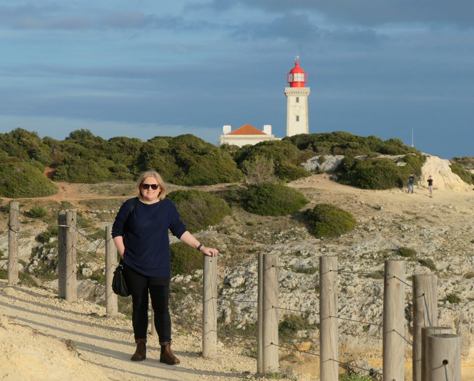There's a path that runs for many miles in each direction from here. It's super scenic, but rather challenging in places and therefore best not tackled in flip flops or sandals.Here's Judith on the path with the Alfanzina Lighthouse in the background.