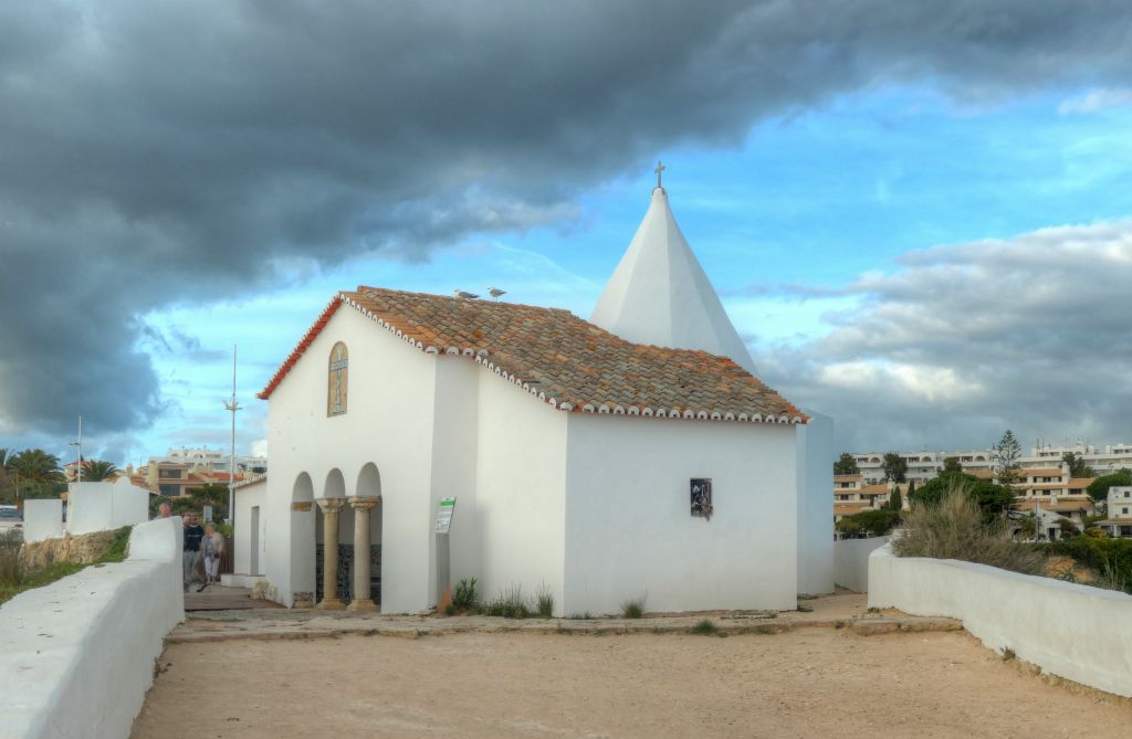 We drove to the Nossa Senhora da Rocha, which is a finger of rock maybe 60 feet wide that reaches out a hundred yards or so into the sea. This small church is built on it.