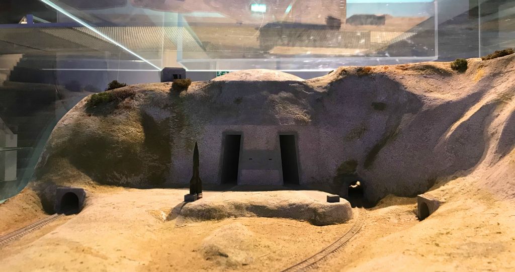 This model in the museum shows what the base would have looked like had it been completed. The dome is visible at the top and the tunnel that we entered the museum through is in the bottom left. The two enormous "doors" are where the completed rockets would have been rolled out for launch. The Germans had planned to launch 50 V2 rockets a day from here.