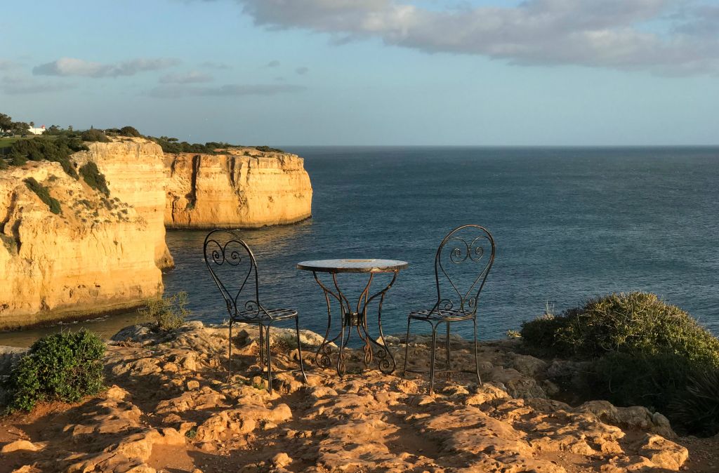I walked west to slightly past the Praia do Vale de Centeanes, where I came across this table and chairs perched on the edge of the cliff. You'll have to take my word for it that they were quite close to a really big drop as I wasn't inclined to venture any closer than this.